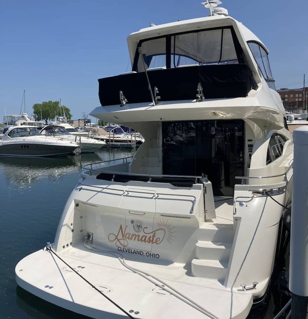 Motor yacht 'Namaste' hailing from Cleveland, Ohio at its slip on Lake Erie